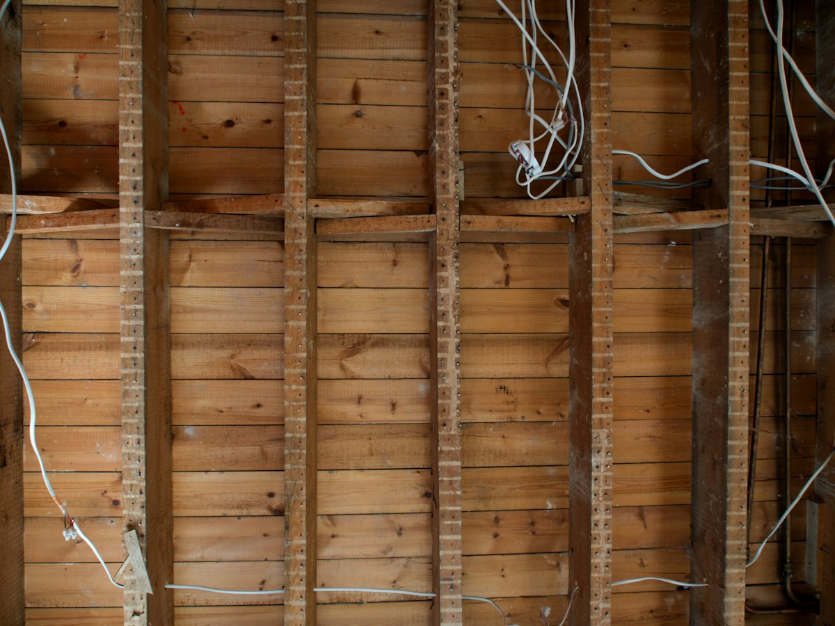 Electrical cable run along wooden wall framing during building work